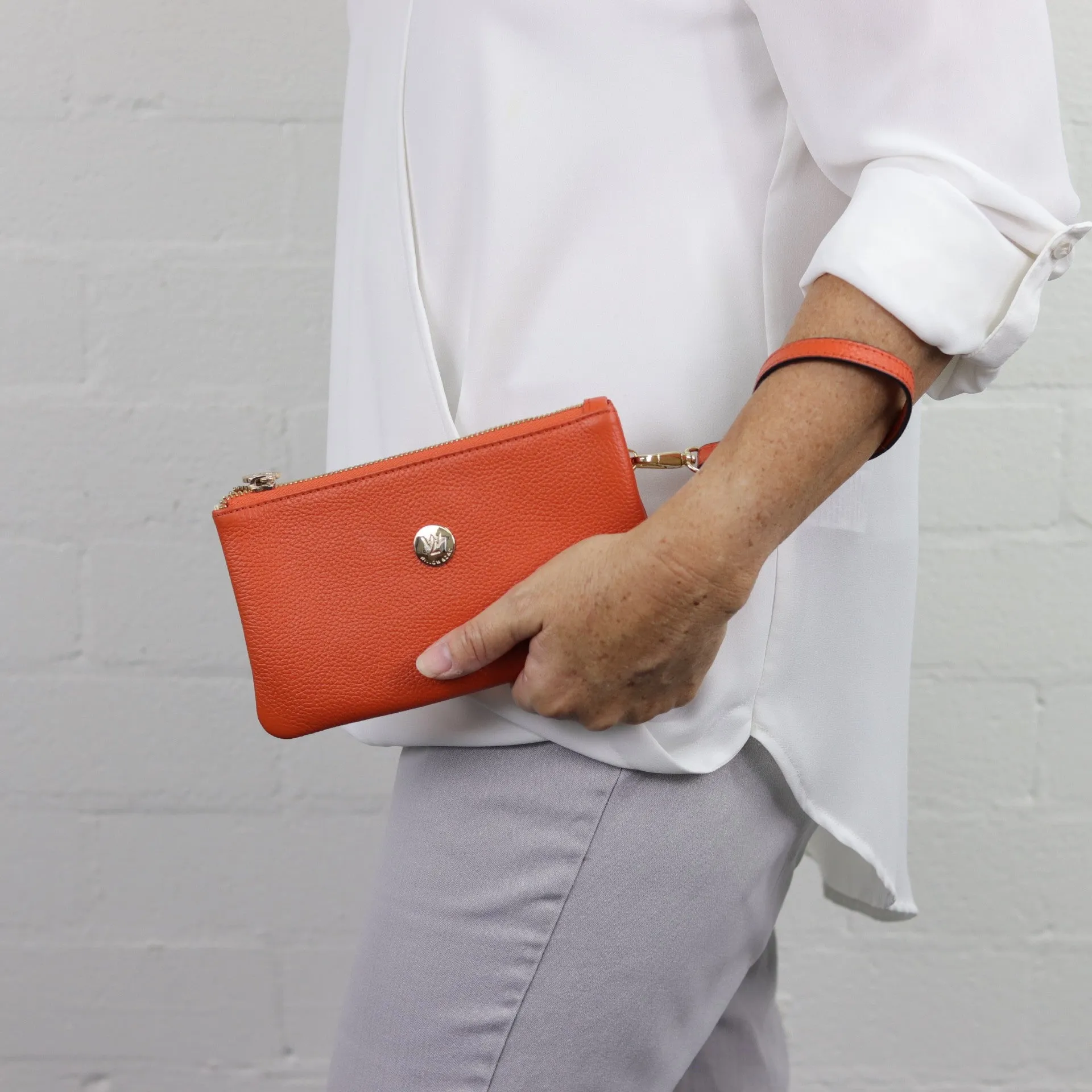 Polly leather or suede wristlet clutch